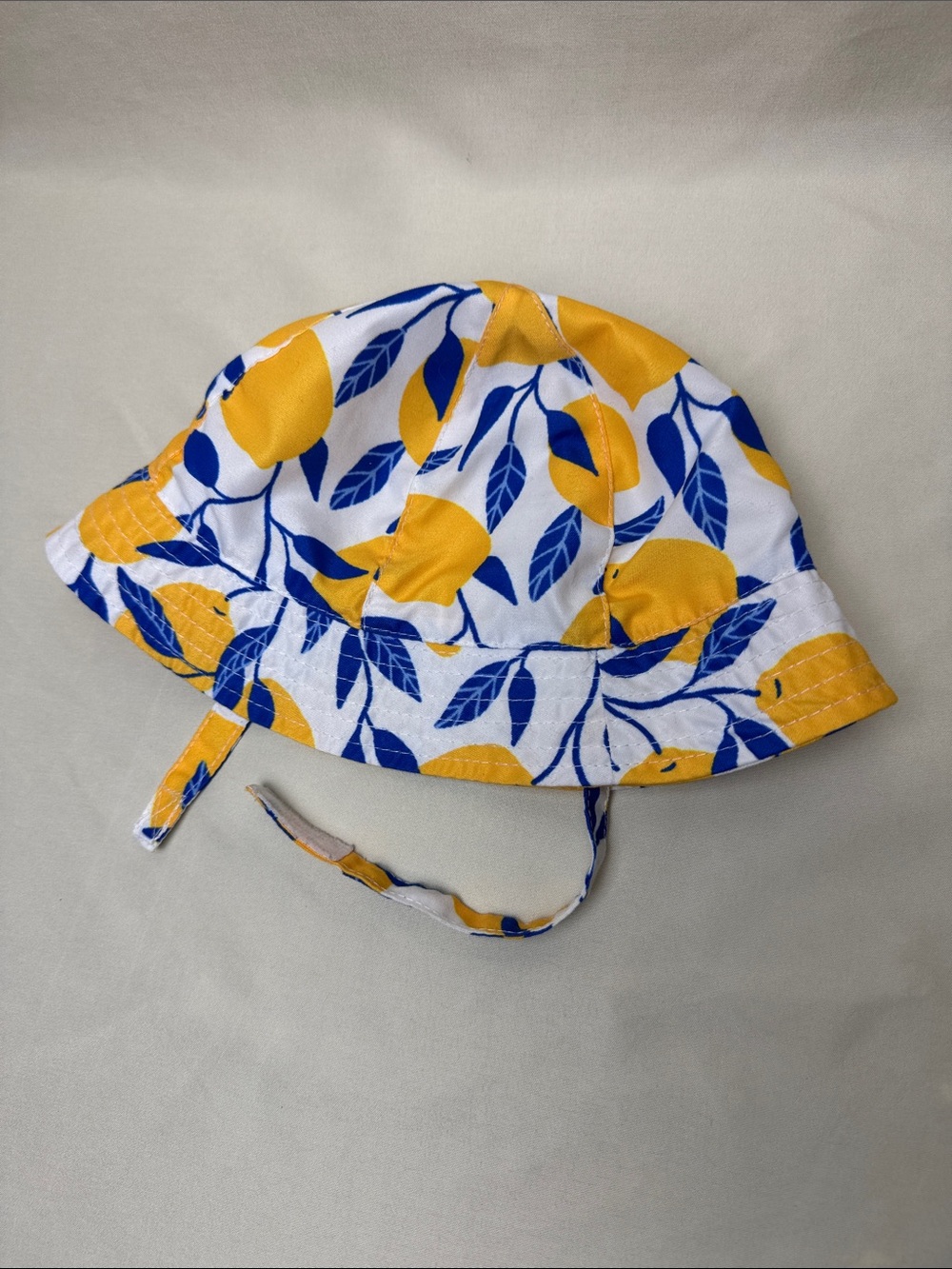 Infant’s Boutique Yellow & Blue Lemon Print Bucket Sun Hat with Chin Strap